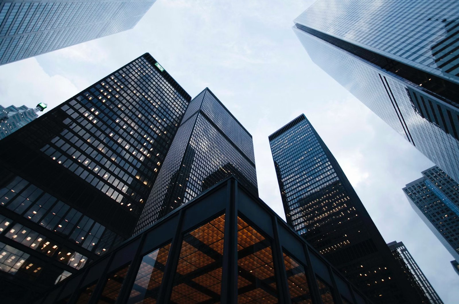 Upward view of high-rise towers against the sky